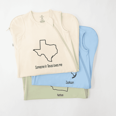 Three baby blankets with Texas-themed designs on a white background