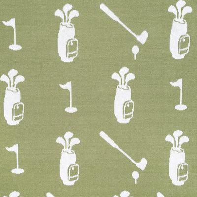 Baby blanket pattern of golf-related items on a green background