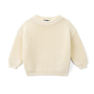 Cream-colored sweater on a white background